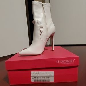 Brand new, never worn booties.